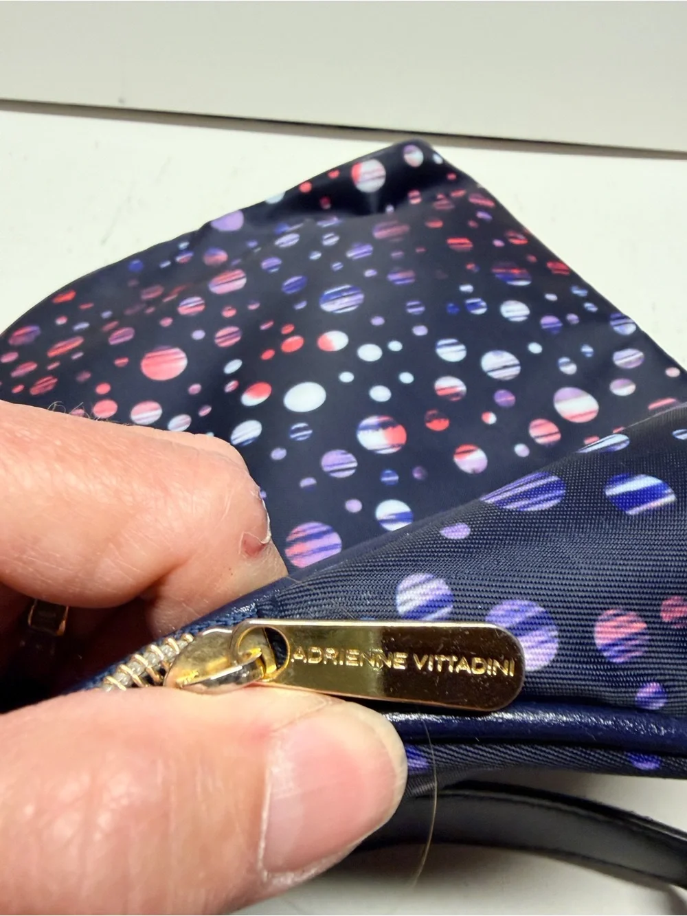 Adrienne Vittadini Navy Cosmetic Bag with Multicolor Dot Pattern